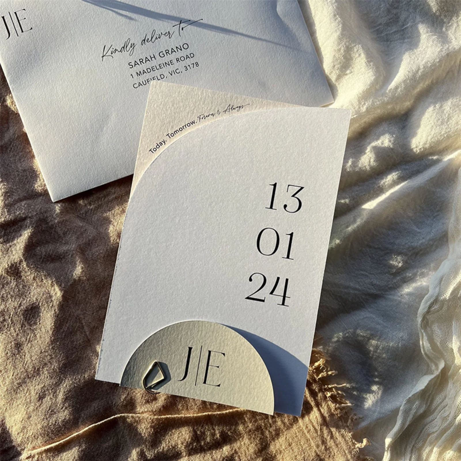 Save the date card with a printed wedding date beside its envelope